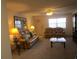 Cozy living room with comfortable seating and a ceiling fan at 1950 59Th N Ave # 212, St Petersburg, FL 33714