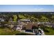 Aerial view of waterfront condos, golf course, and St. Pete skyline in the background at 2617 Cove Cay Dr # 710, Clearwater, FL 33760