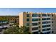 Exterior view of a condo building highlighting large windows and building architecture at 2617 Cove Cay Dr # 710, Clearwater, FL 33760