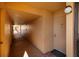 Hallway leading to condo units with neutral walls and carpet at 2617 Cove Cay Dr # 710, Clearwater, FL 33760