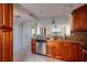 Kitchen with granite countertops, stainless steel appliances, and view to other rooms at 2617 Cove Cay Dr # 710, Clearwater, FL 33760
