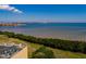 Stunning water view from this condo overlooking lush greenery with a glimpse of the city skyline in the distance at 2617 Cove Cay Dr # 710, Clearwater, FL 33760