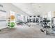 Well-equipped fitness center featuring modern exercise machines, free weights, and ample space for a complete workout at 2748 Garden Plum Pl, Odessa, FL 33556