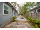 Spacious backyard with a dining area and lush landscaping for outdoor enjoyment at 311 W Chelsea St, Tampa, FL 33603