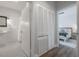 Bright bathroom with stylish mosaic floors, white subway tile, and an adjacent bedroom view at 311 W Chelsea St, Tampa, FL 33603