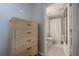 A bright and airy bathroom, viewed through a doorway at 311 W Chelsea St, Tampa, FL 33603