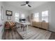 Inviting home office featuring natural light, neutral colors, and hardwood floors at 311 W Chelsea St, Tampa, FL 33603