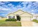 Charming single-Gathering home with a well-maintained lawn and a two-car garage, perfect for suburban living at 35661 Jenny Lynne Cir, Zephyrhills, FL 33541