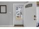 Open front door view looking towards the screened patio and exterior stairs at 3710 41St S Way # D, St Petersburg, FL 33711