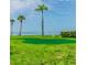 Outdoor putting green and tropical vegetation near the water at 3710 41St S Way # D, St Petersburg, FL 33711