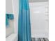 Bathroom with a white shower and toilet at 3710 41St S Way # D, St Petersburg, FL 33711