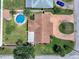 Overhead view of property showcasing the pool, brick paved circular driveway and landscaping at 4581 21St N Ave, St Petersburg, FL 33713