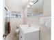 Bathroom with tiled walls, modern fixtures, and glass shower door at 4581 21St N Ave, St Petersburg, FL 33713