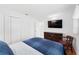 This bedroom offers ample storage with a large dresser, closet, and comfortable seating at 4581 21St N Ave, St Petersburg, FL 33713