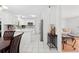 Open concept, showing the table, chairs, and view of the kitchen and living spaces, excellent for gatherings at 4581 21St N Ave, St Petersburg, FL 33713