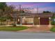 Charming single-story home featuring a cozy front porch, brick accents, and well-manicured landscaping at 4581 21St N Ave, St Petersburg, FL 33713