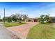 Charming single-story home featuring a brick driveway, covered entry, and manicured lawn at 4581 21St N Ave, St Petersburg, FL 33713