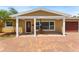 Charming home featuring a covered front porch and beautiful brick paved driveway at 4581 21St N Ave, St Petersburg, FL 33713