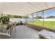 Spacious covered patio overlooking the private backyard, ideal for outdoor entertaining and relaxation at 4581 21St N Ave, St Petersburg, FL 33713