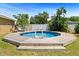 Backyard swimming pool featuring a wooden deck surround and refreshing space to relax and enjoy the outdoors at 4581 21St N Ave, St Petersburg, FL 33713