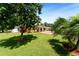 Beautiful lawn and trees in the backyard of a single-story home at 4581 21St N Ave, St Petersburg, FL 33713