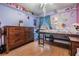 Comfortable bedroom with great natural light and laminate wood flooring at 4613 Portobello Cir, Valrico, FL 33596