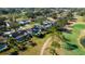 Aerial view of homes in the community backing onto the golf course and pond at 4617 Cloverlawn Dr, Tampa, FL 33624