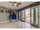 Florida room leads to a screened in pool with patio at 4617 Cloverlawn Dr, Tampa, FL 33624