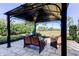 The outdoor gazebo has comfortable seating and landscaping at 4617 Cloverlawn Dr, Tampa, FL 33624