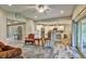 Spacious living room open to the kitchen, featuring recessed lighting and seamless access to the backyard at 470 Sunset N Rd, Rotonda West, FL 33947
