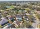 Aerial view of neighborhood with a pond and a community pool at 4710 69Th E Ct, Palmetto, FL 34221