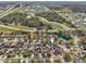 Aerial view of a neighborhood near a large highway and bodies of water at 4710 69Th E Ct, Palmetto, FL 34221