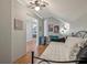 Bedroom with a window, ceiling fan, and wood-look floors at 4710 69Th E Ct, Palmetto, FL 34221