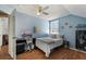 Bedroom with a window, ceiling fan, and wood-look floors, and a desk at 4710 69Th E Ct, Palmetto, FL 34221