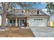 Charming single-Gathering home featuring a spacious front porch and well-manicured lawn at 4710 69Th E Ct, Palmetto, FL 34221