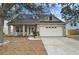 Charming single-Gathering home featuring a spacious front porch and well-manicured lawn at 4710 69Th E Ct, Palmetto, FL 34221