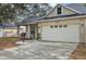 Charming single-Gathering home featuring a spacious front porch and a two car garage at 4710 69Th E Ct, Palmetto, FL 34221