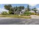 Charming home with mature trees, well-maintained landscaping, and a welcoming facade at 4925 16Th N Ave, St Petersburg, FL 33710