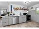 Well-organized kitchen showcasing stainless steel appliances, stylish decor, and efficient storage solutions at 4925 16Th N Ave, St Petersburg, FL 33710