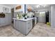 Cozy kitchen featuring stainless steel appliances, gray cabinetry, and ample counter space at 4925 16Th N Ave, St Petersburg, FL 33710
