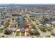 Scenic aerial view capturing a waterfront neighborhood with homes nestled among lush trees and waterways at 5050 Venetian Ne Blvd, St Petersburg, FL 33703