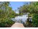 A private backyard dock provides access to beautiful canal waters at 5050 Venetian Ne Blvd, St Petersburg, FL 33703