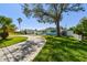 Lovely single-story home with a circular driveway and lush landscaping at 5050 Venetian Ne Blvd, St Petersburg, FL 33703