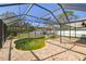 Screened pool with hot tub, perfect for relaxation and entertaining in a private backyard setting at 5050 Venetian Ne Blvd, St Petersburg, FL 33703