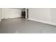 Large garage interior offering plenty of space for multiple vehicles and storage at 520 Wheaton Trent Pl, Tampa, FL 33619