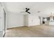 Bright and open living room leading into a modern kitchen at 520 Wheaton Trent Pl, Tampa, FL 33619