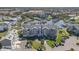 Aerial view of the condo and surrounding area, showing the nearby harbor and beautiful blue water at 5722 Biscayne Ct # 308, New Port Richey, FL 34652