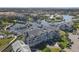 Aerial view of the condo community and canal at 5722 Biscayne Ct # 308, New Port Richey, FL 34652