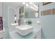 Elegant bathroom featuring a contemporary vessel sink and nautical themed decorations at 5722 Biscayne Ct # 308, New Port Richey, FL 34652