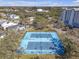 Aerial view of community tennis courts with professional surface, perfect for active residents at 5722 Biscayne Ct # 308, New Port Richey, FL 34652